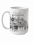 Christmas in Edmonton mug with a black-and-white festive town scene on a white background.