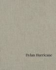 Textured beige fabric swatch with 'Dylan Hurricane' label in St. Albert