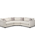White sectional sofa with gray accent cushions on a white background in St. Albert