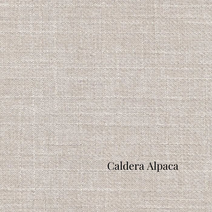 Textured beige fabric with 'Caldera Alpaca' label in St. Albert