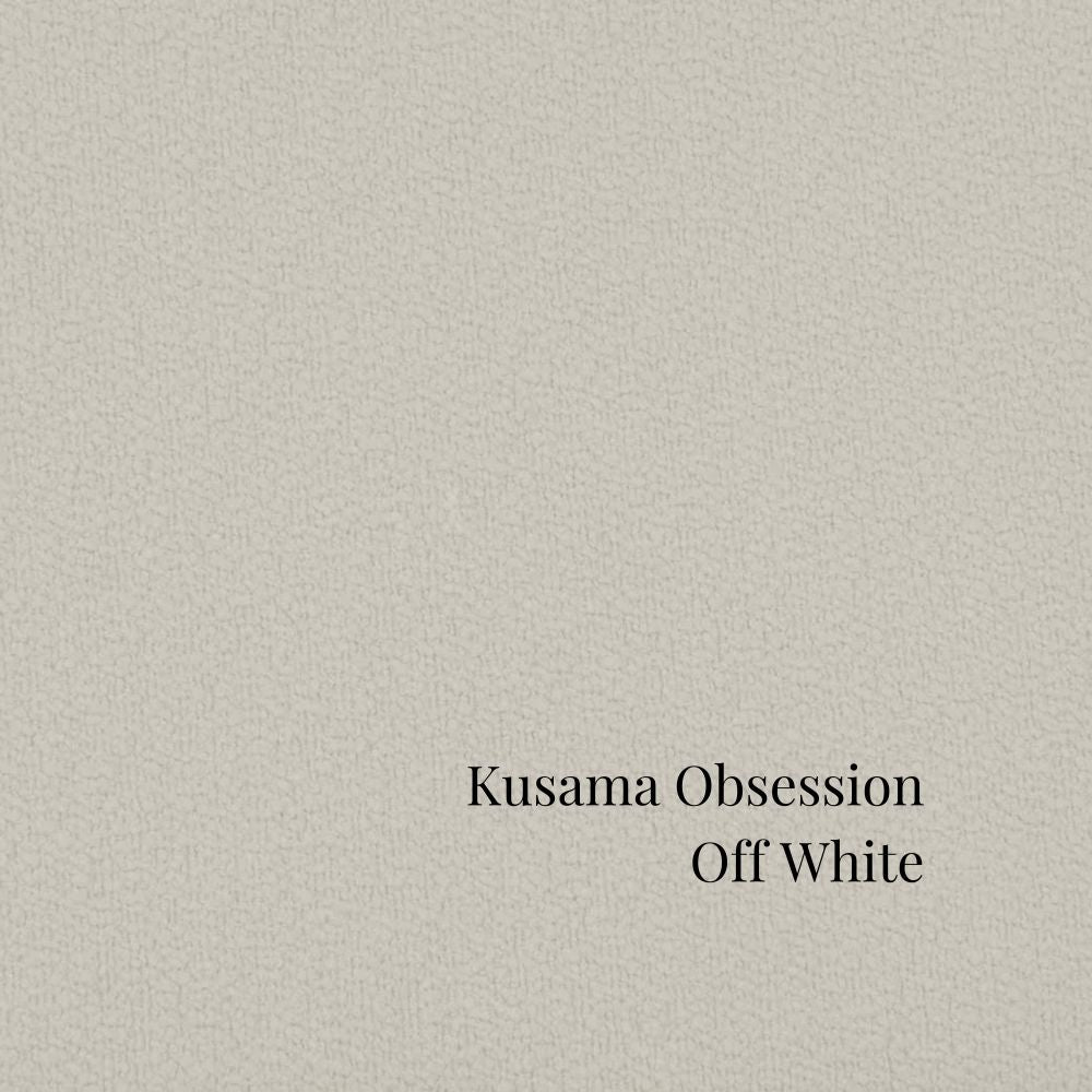 Text 'Kusama Obsession Off White' on a textured off-white background in St. Albert